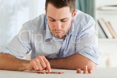 Businessman counting his small change