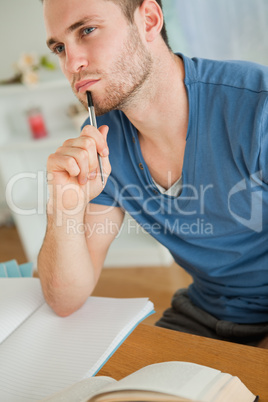 Young student doing his homework