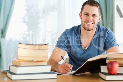 Smiling student preparing for test