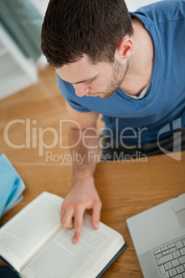 Student focuses on his book