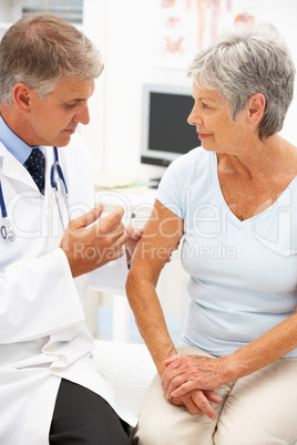 Doctor with female patient