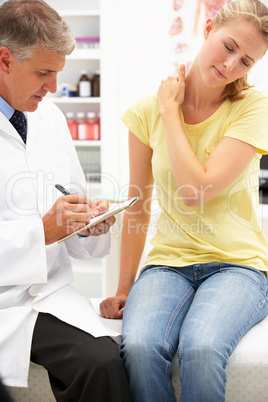 Doctor with female patient