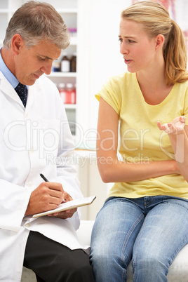 Doctor with female patient