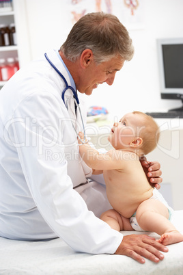 Pediatrician with baby