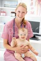 Pediatrician with baby