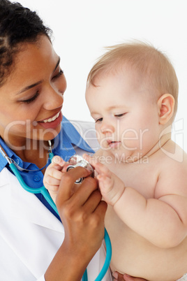 Pediatrician with baby