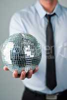 Business man with mirror ball