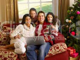 Hispanic family Christmas shopping online