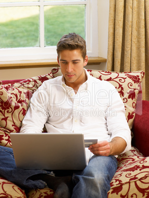 Young Hispanic couple shopping online