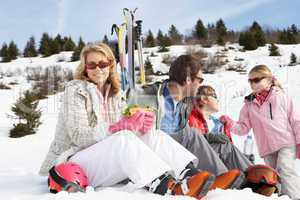 Young Family On Ski Vacation