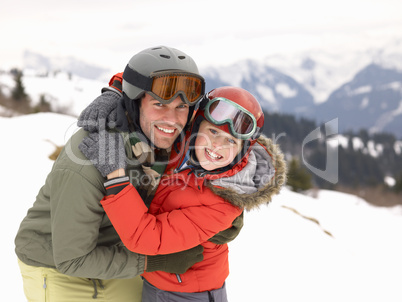 Young Father And Son On Winter Vacation