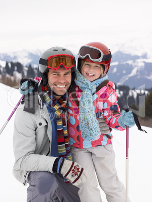 Young Father And Daughter On Ski Vacation