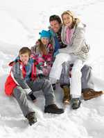 Young Family On Winter Vacation