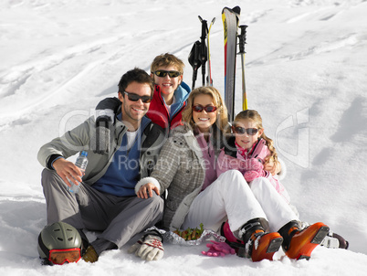 Young Family On Ski Vacation