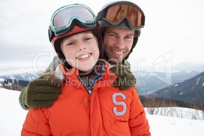 Young Father And Son On Winter Vacation