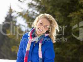 Young Woman  In Alpine Snow Scene