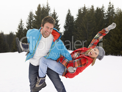 Young Woman  In Alpine Snow Scene