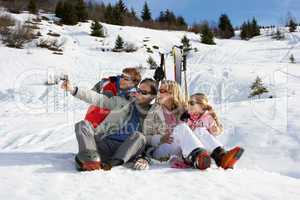 Young Family On Ski Vacation