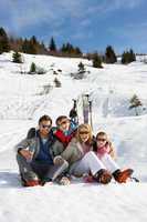 Young Family On Ski Vacation