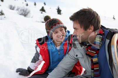 Young Father And Son In Snowy Landscape