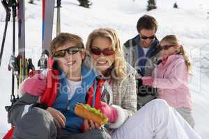 Young Family On Ski Vacation