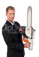 Young business man with chainsaw