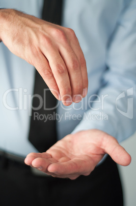 Business man gesturing with his hands