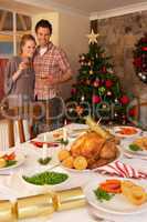 Young couple at home at Christmas