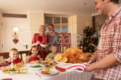 Family having Christmas dinner