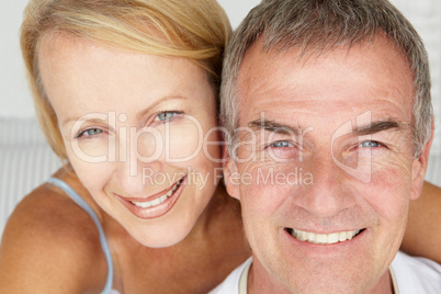 Mid age couple head and shoulders