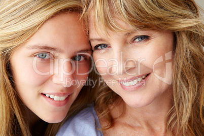 Close up mother with teenage daughter