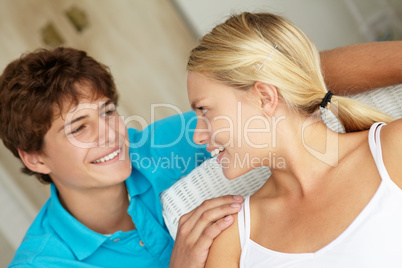 Portrait teenage girl and boy at home