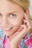 Teenage girl wearing earphones