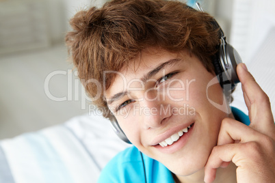 Teenage boy wearing headphones