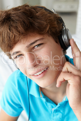 Teenage boy wearing headphones