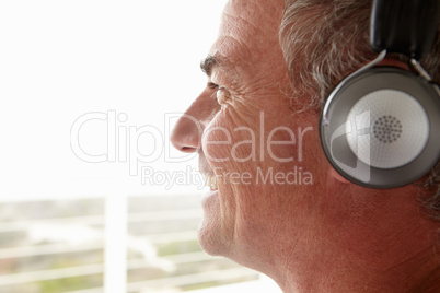 Mid age man wearing headphones