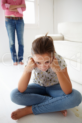 Young girl in trouble with mother