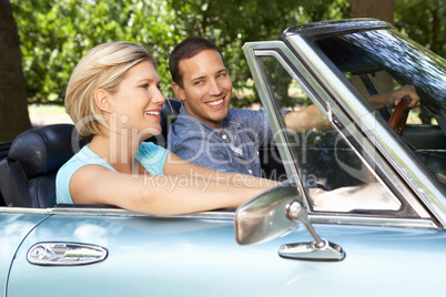 Couple in sports car