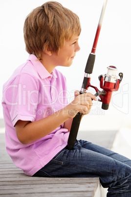 Young boy with fishing rod