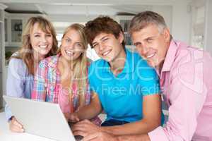 Family using laptop