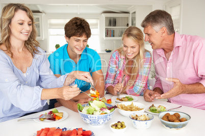 Family enjoying meal at home