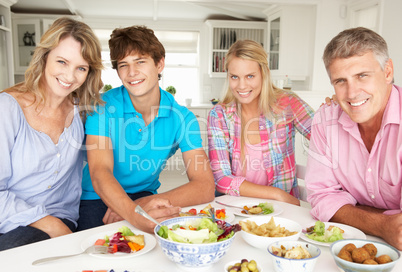 Family enjoying meal at home