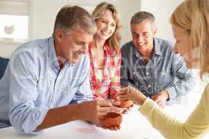 Mid age couples clay modelling