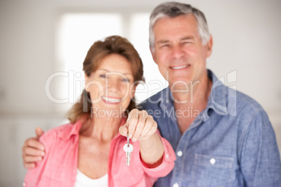 Senior couple moving into new home