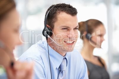 Young businessman wearing headset