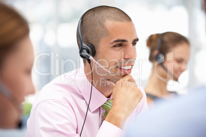 Young businessman wearing headset