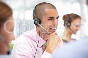 Young businessman wearing headset