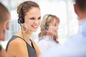 Young businesswoman wearing headset