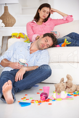 Exhausted parents resting