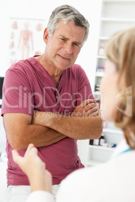 Senior man visiting doctor